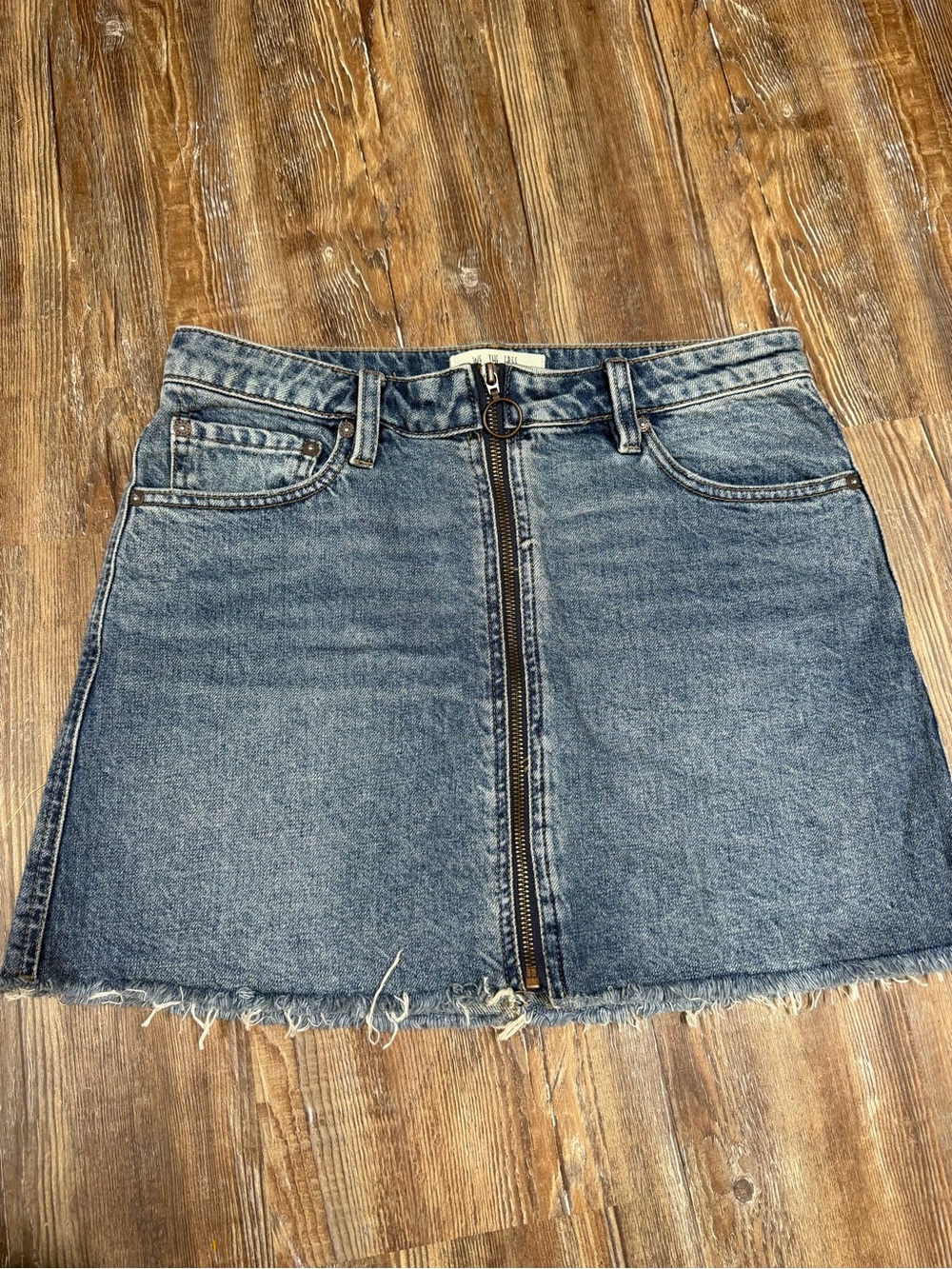 Free People blue denim mini skirt with zipper detail, size 28